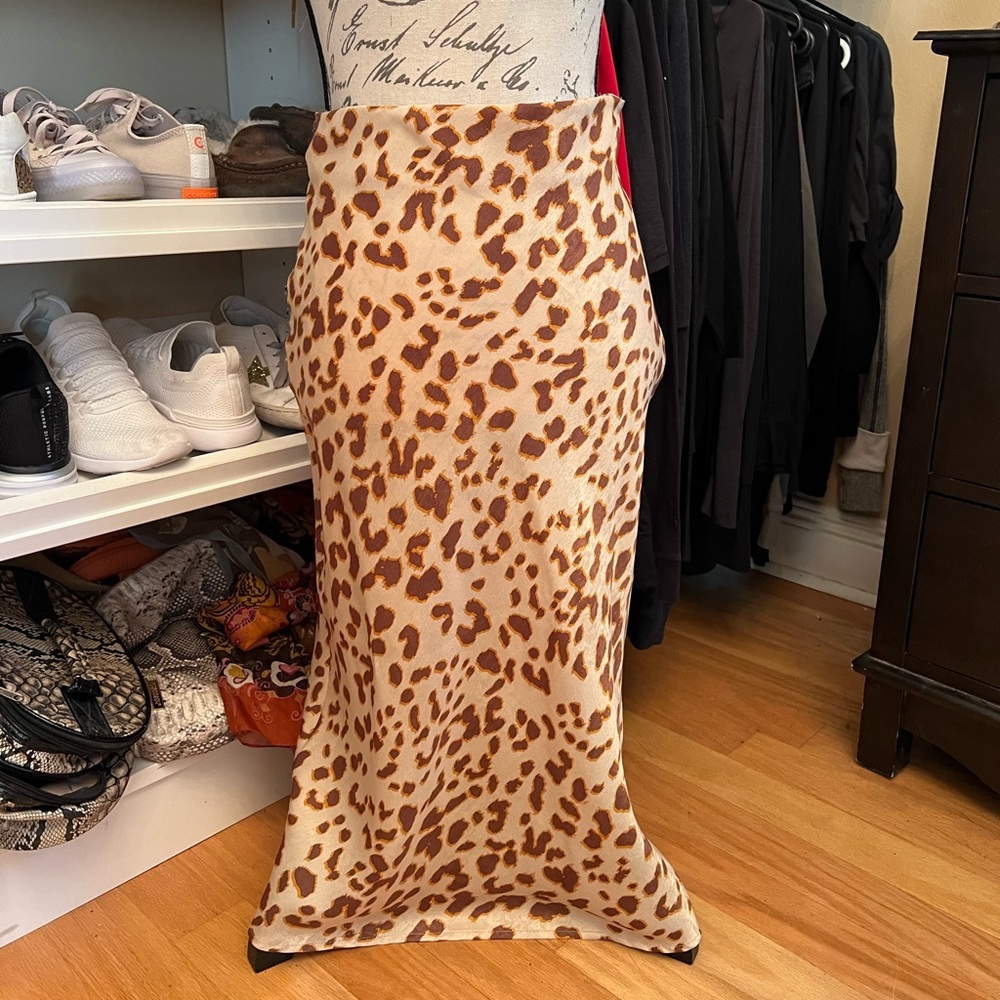 Mid calf silky maxi skirt. Never worn
